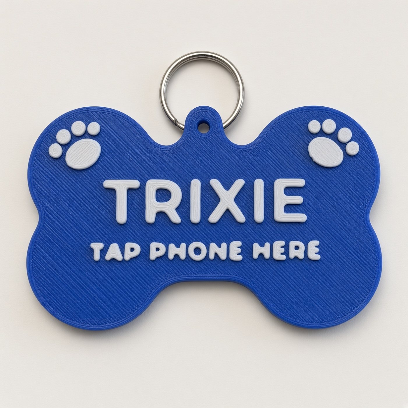 Blue bone tag with white lettering